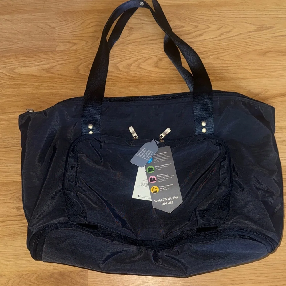 Baggallini NWT navy travel bag expandable